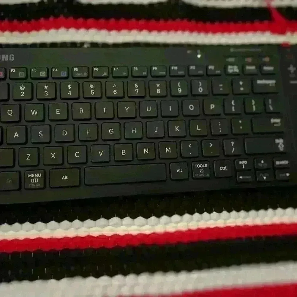 Samsung Bluetooth Keyboard with remote functionality & track pad. 2AA batteries